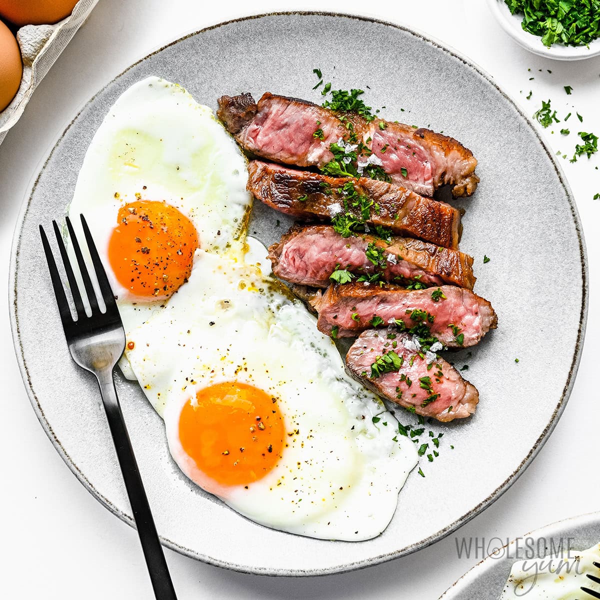 2 Eggs sirlon steak served w/ Homefries + Toast